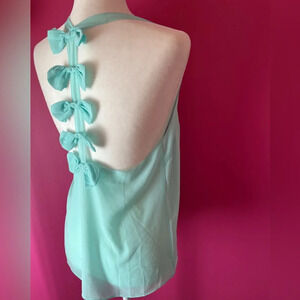 Millau bows tunic